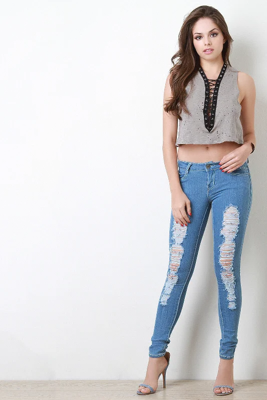 Distressed Mid Rise Skinny Jeans